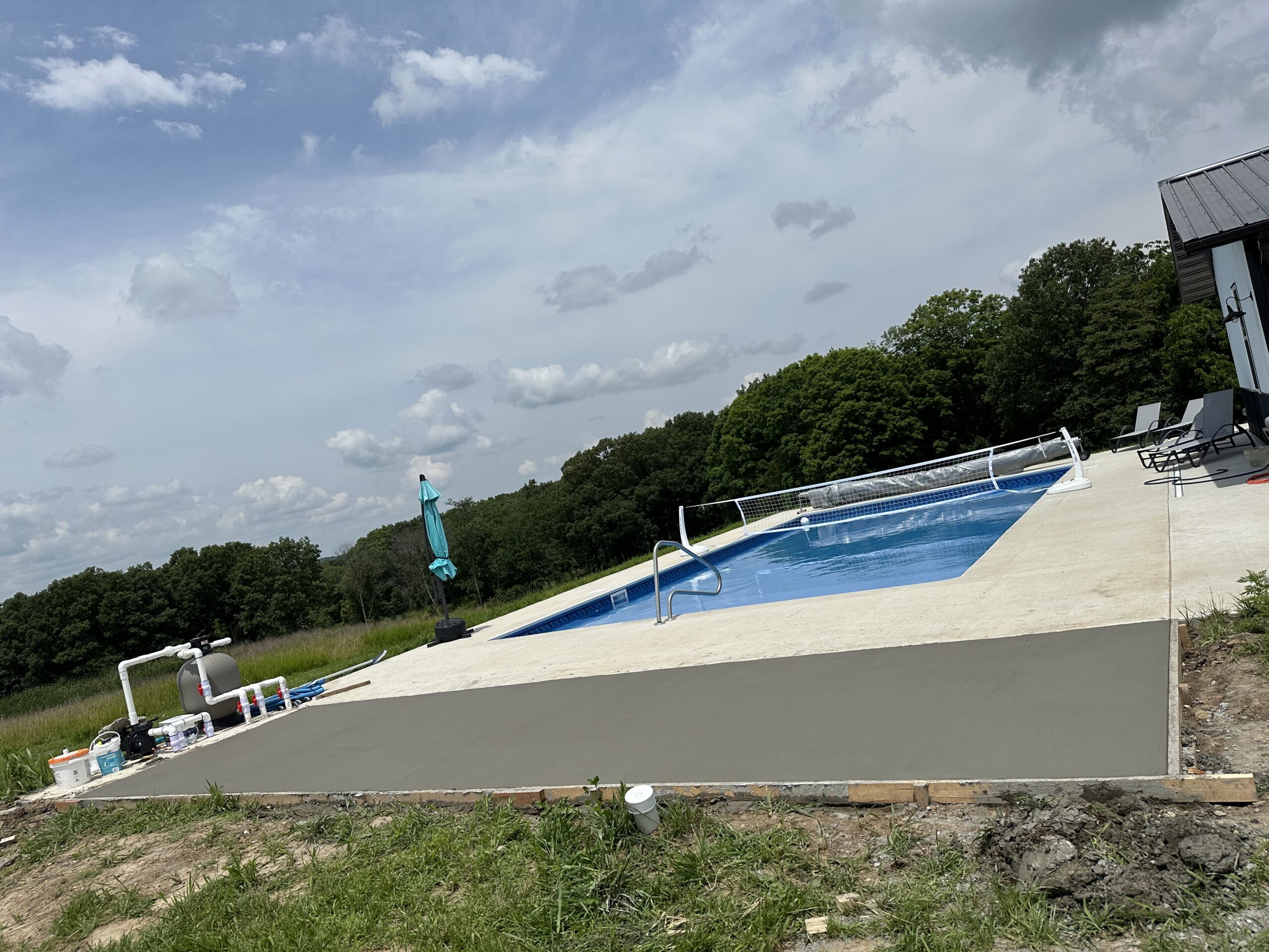 Pool concrete extension by Williams Construction